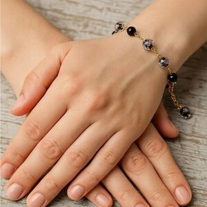 Elegant Gold and Black Bracelet